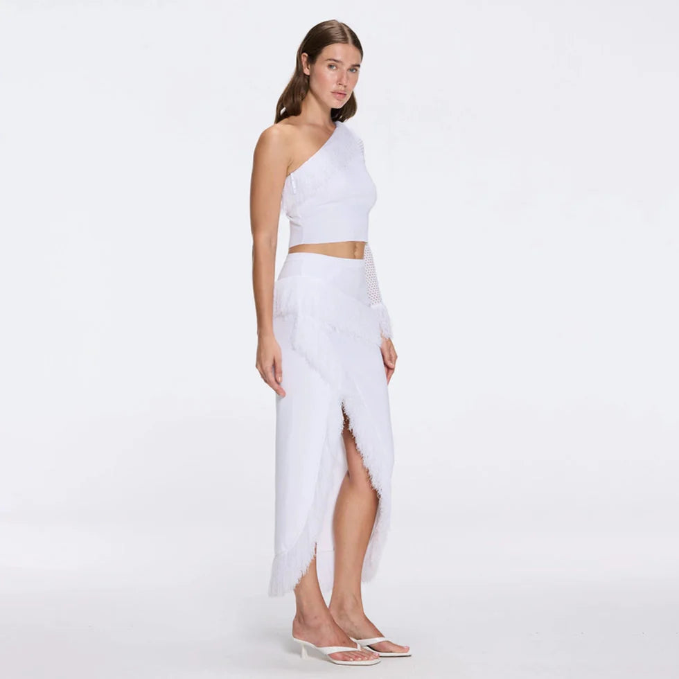 Monroe & Alani Fringe Asymmetric Knit White Set | Moeva | Set | Each week unveils new pieces—luxury swimwear, fluid resort silhouettes, and elevated summer-to-evening essentials designed to carry you from coastal escapes to city nights.