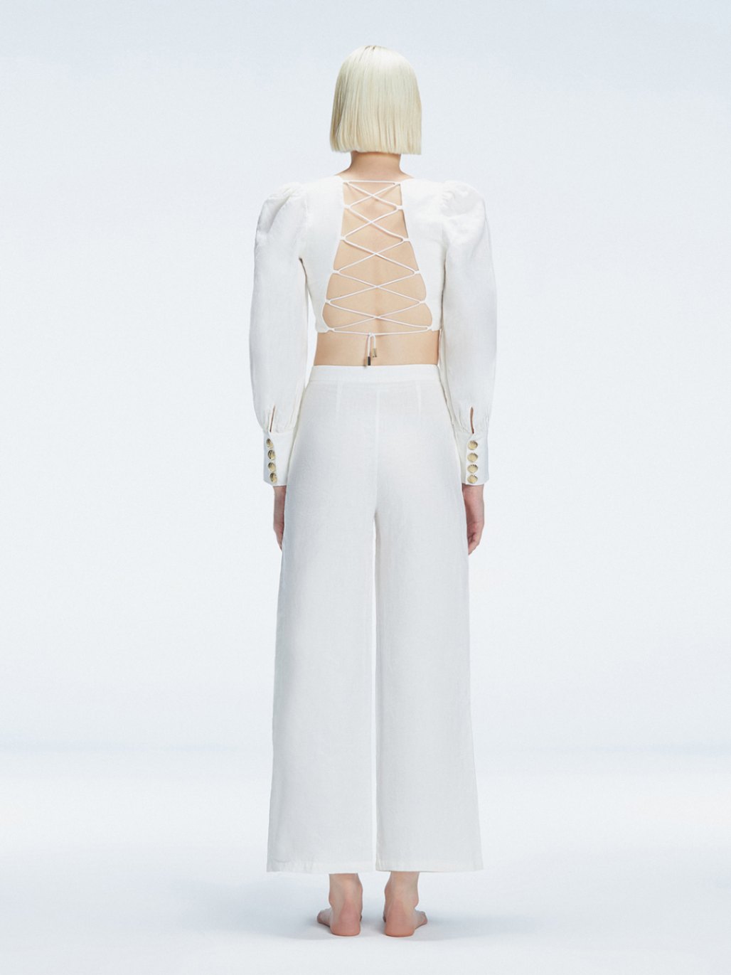 Gemma White Linen Square Neck - Long Sleeve Crop Top | Moeva | Crop Top | Each week unveils new pieces—luxury swimwear, fluid resort silhouettes, and elevated summer-to-evening essentials designed to carry you from coastal escapes to city nights.