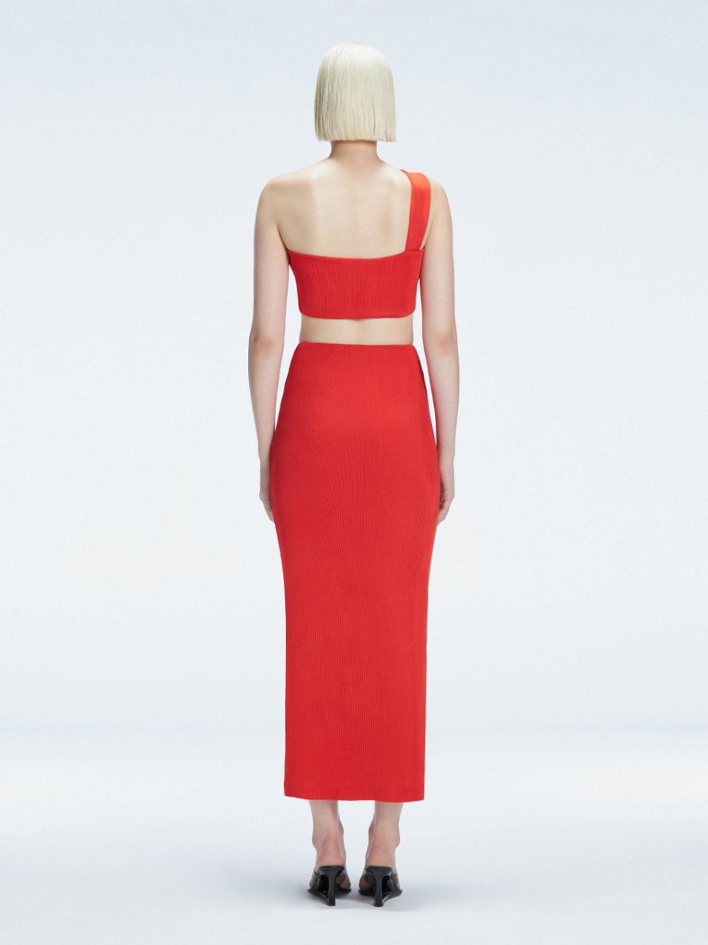 Esmeralda Red Maxi Skirt with Front Ruched Detail | Moeva | Skirt | Each week unveils new pieces—luxury swimwear, fluid resort silhouettes, and elevated summer-to-evening essentials designed to carry you from coastal escapes to city nights.