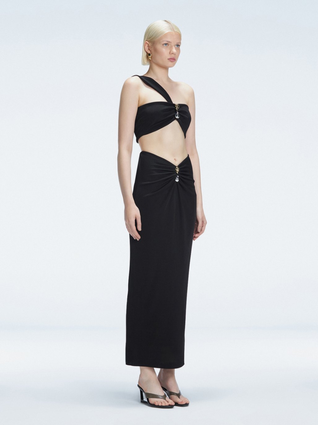 Esmeralda Black Maxi Skirt with Front Ruched Detail | Moeva | Skirt | Each week unveils new pieces—luxury swimwear, fluid resort silhouettes, and elevated summer-to-evening essentials designed to carry you from coastal escapes to city nights.