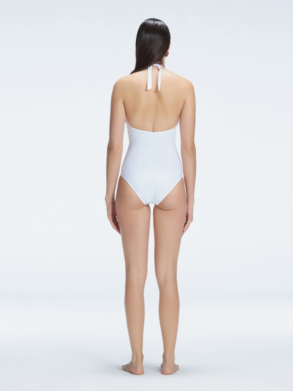 Miley White Halter Swimsuit | Moeva | Swimsuit | Each week unveils new pieces—luxury swimwear, fluid resort silhouettes, and elevated summer-to-evening essentials designed to carry you from coastal escapes to city nights.