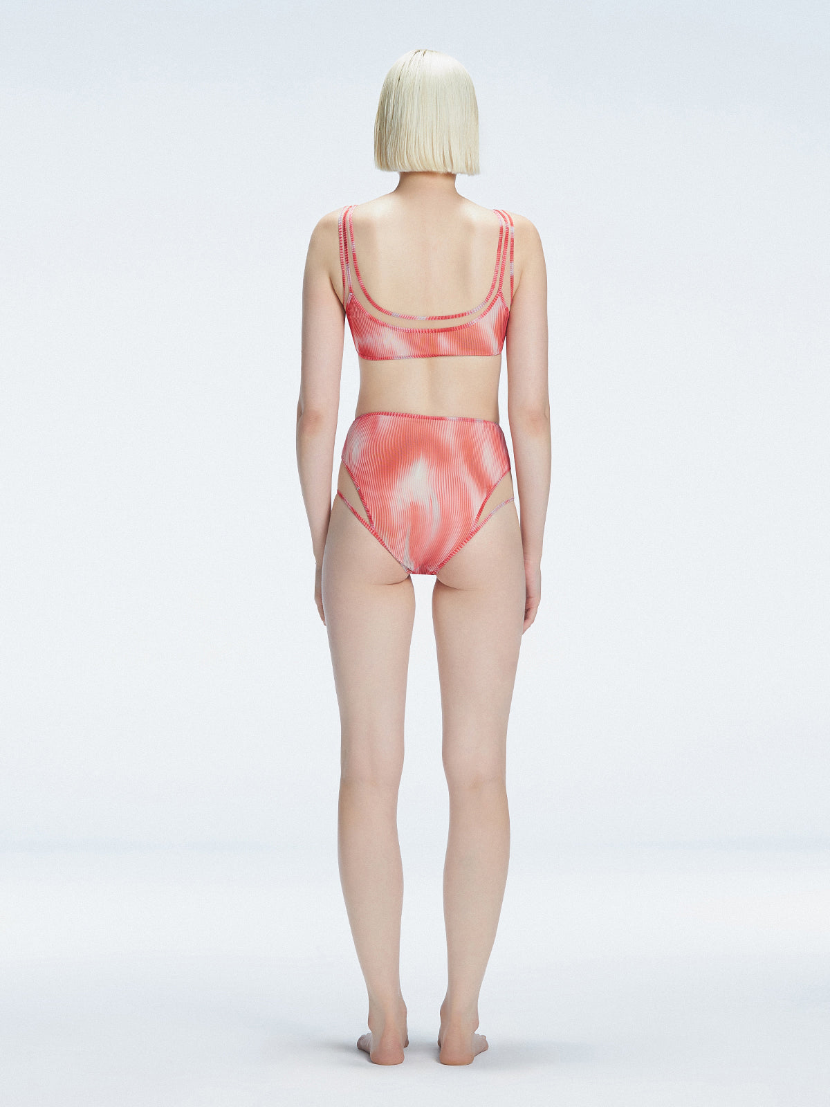 Rosalind Red Optical Scoop Neck 3D Print Bikini Top | Moeva | Bikini Top | Each week unveils new pieces—luxury swimwear, fluid resort silhouettes, and elevated summer-to-evening essentials designed to carry you from coastal escapes to city nights.