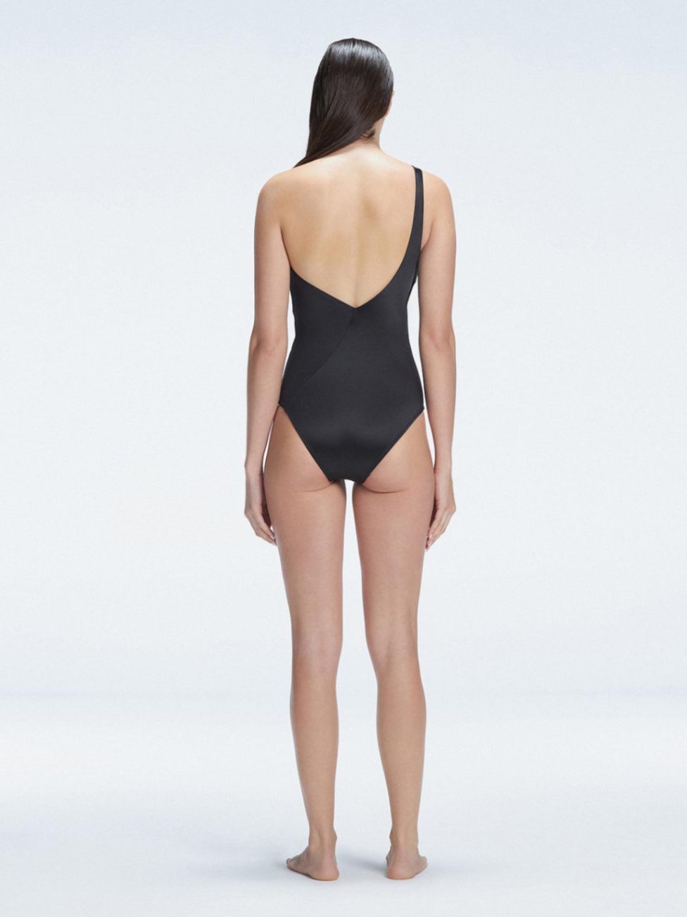 Solene Black One Shoulder Swimsuit | Moeva | Swimsuit | Each week unveils new pieces—luxury swimwear, fluid resort silhouettes, and elevated summer-to-evening essentials designed to carry you from coastal escapes to city nights.