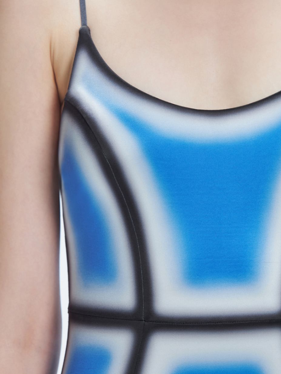 Seraphina Blue Optical Scoop Neck Swimsuit | Moeva | Swimsuit | Each week unveils new pieces—luxury swimwear, fluid resort silhouettes, and elevated summer-to-evening essentials designed to carry you from coastal escapes to city nights.