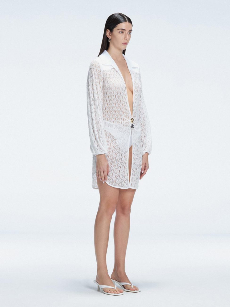 Editorial - Althea White Long Sleeve Lace Mini Kaftan | Moeva | Kaftan | Each week unveils new pieces—luxury swimwear, fluid resort silhouettes, and elevated summer-to-evening essentials designed to carry you from coastal escapes to city nights.