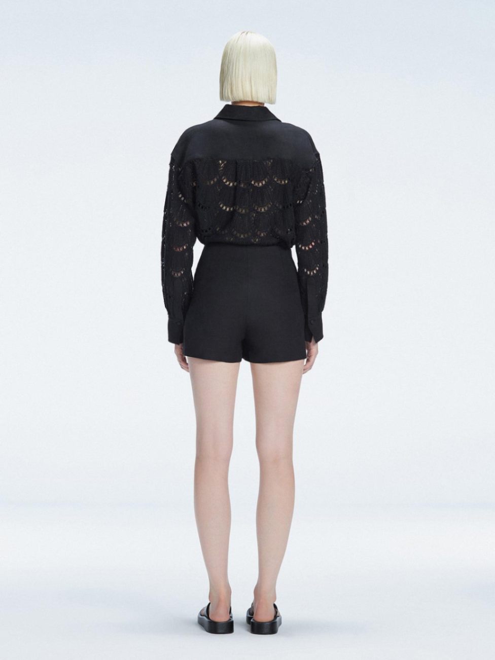 Elise Black Linen Mini Skort | Moeva | Skort | Each week unveils new pieces—luxury swimwear, fluid resort silhouettes, and elevated summer-to-evening essentials designed to carry you from coastal escapes to city nights.
