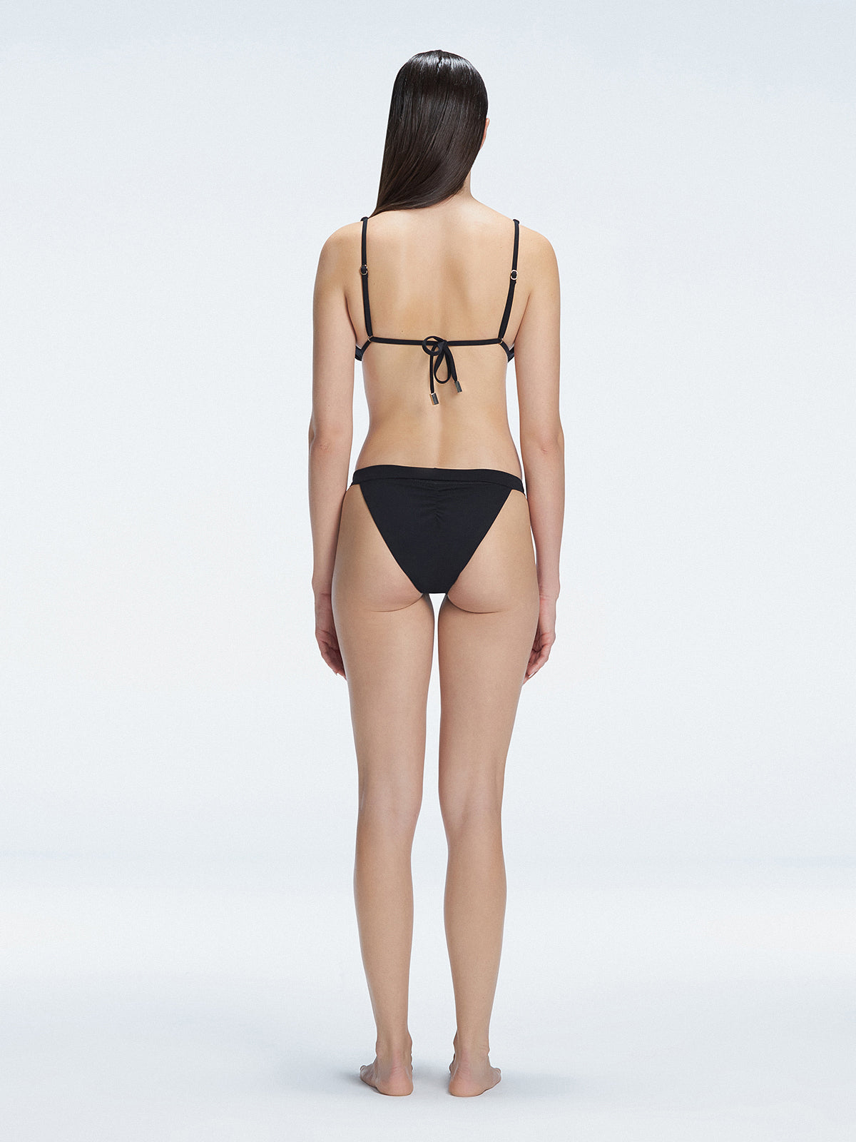 Zella Black Triangle Solid Bikini Top | Moeva | Bikini Top | Each week unveils new pieces—luxury swimwear, fluid resort silhouettes, and elevated summer-to-evening essentials designed to carry you from coastal escapes to city nights.