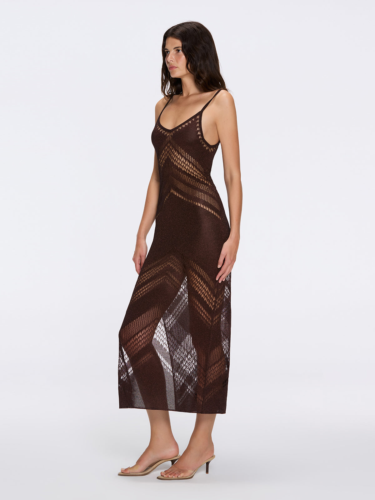 Beaulieu Brown Metallic Knit Maxi Dress with V-Neckline and Side Slit | Moeva | Dress | Each week unveils new pieces—luxury swimwear, fluid resort silhouettes, and elevated summer-to-evening essentials designed to carry you from coastal escapes to city nights.