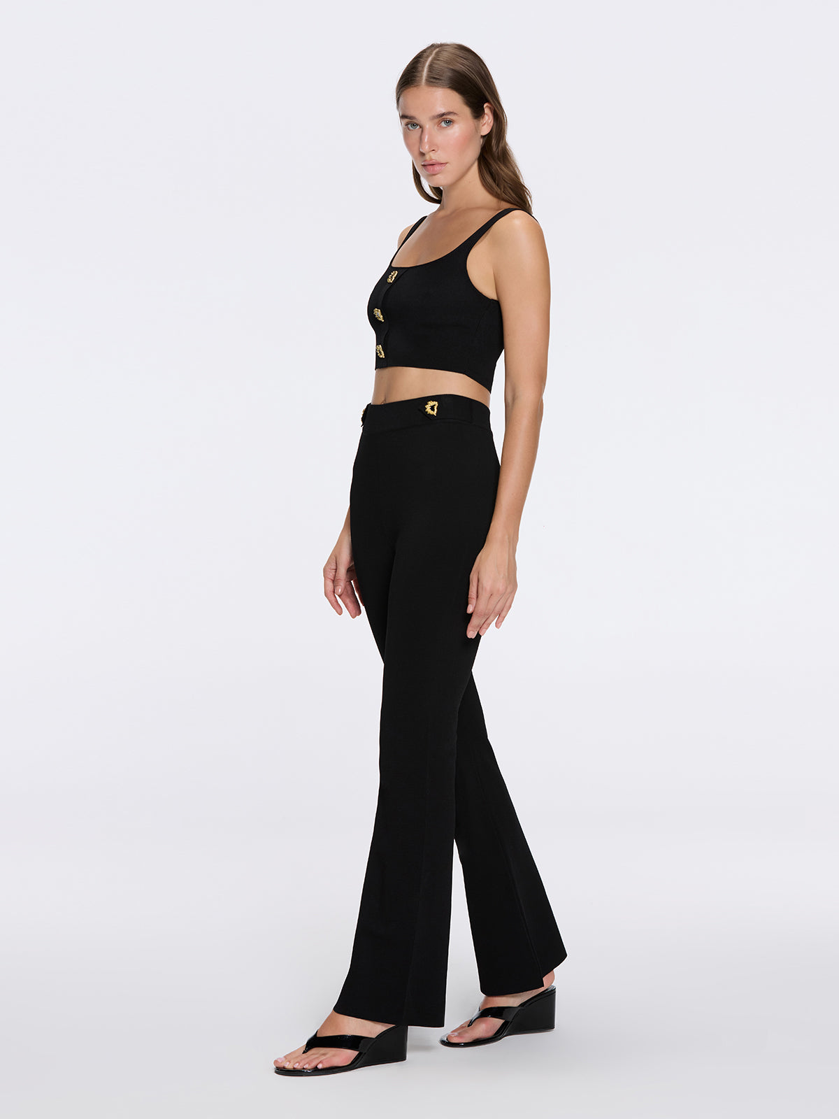 Colette Black Knitted Black High Waisted Wide-Leg Pants | Moeva | Pants | Each week unveils new pieces—luxury swimwear, fluid resort silhouettes, and elevated summer-to-evening essentials designed to carry you from coastal escapes to city nights.