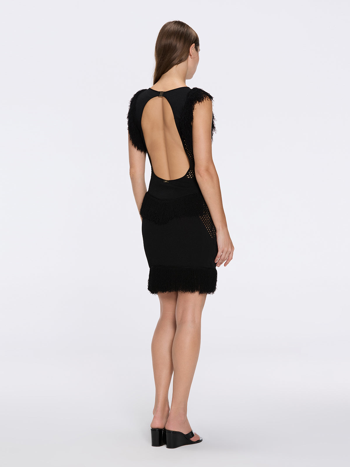 Diani Black Fringe Detail Sheer Panel Open Back Mini Dress | Moeva | Dress | Each week unveils new pieces—luxury swimwear, fluid resort silhouettes, and elevated summer-to-evening essentials designed to carry you from coastal escapes to city nights.