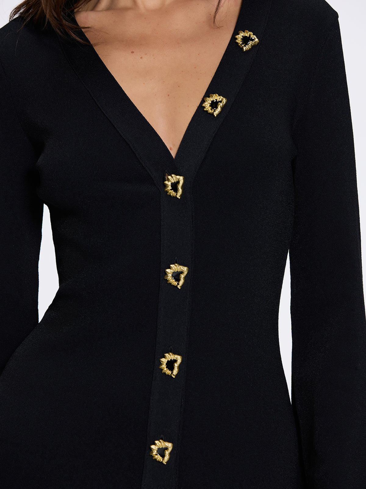 Brezia Black Knitted Maxi Dress with Long Sleeves and Gold Button Details | Moeva | Dress | Each week unveils new pieces—luxury swimwear, fluid resort silhouettes, and elevated summer-to-evening essentials designed to carry you from coastal escapes to city nights.
