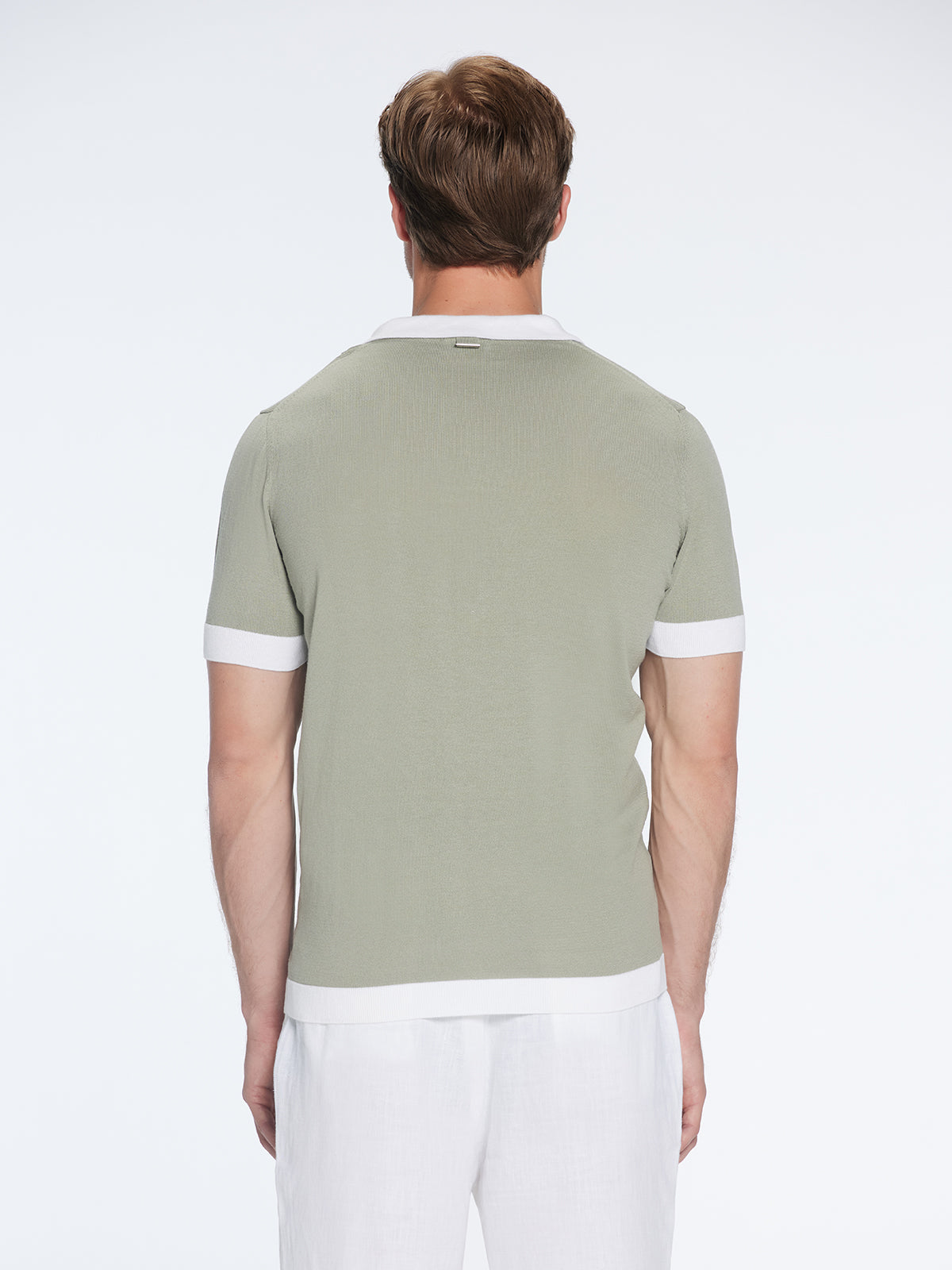 Troy Green/White V-Neck T-Shirt with Contrast Trim | Moeva | T-Shirt | Each week unveils new pieces—luxury swimwear, fluid resort silhouettes, and elevated summer-to-evening essentials designed to carry you from coastal escapes to city nights.
