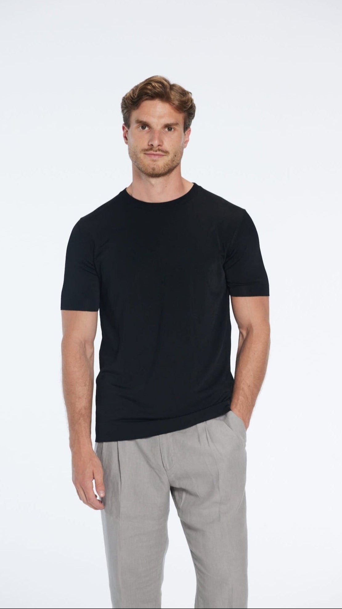 Atlas Black Cotton Round Neck T-Shirt | Moeva | T-Shirt | Each week unveils new pieces—luxury swimwear, fluid resort silhouettes, and elevated summer-to-evening essentials designed to carry you from coastal escapes to city nights.