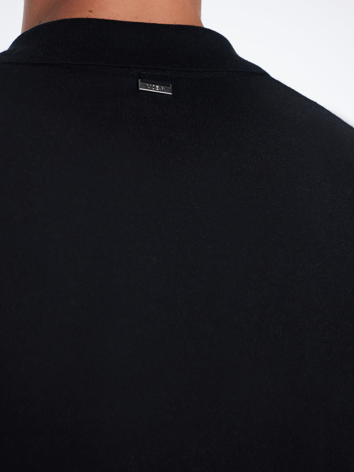 Johan Black Cotton Polo Shirt | Moeva | T-Shirt | Each week unveils new pieces—luxury swimwear, fluid resort silhouettes, and elevated summer-to-evening essentials designed to carry you from coastal escapes to city nights.