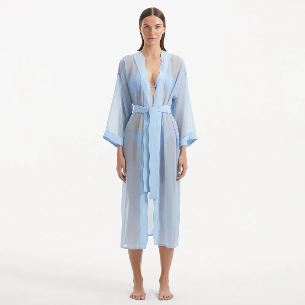 Blaze Long Sleeve Wavy-Trim Belted Sheer Baby Blue Kaftan | Moeva | Kaftan | Each week unveils new pieces—luxury swimwear, fluid resort silhouettes, and elevated summer-to-evening essentials designed to carry you from coastal escapes to city nights.