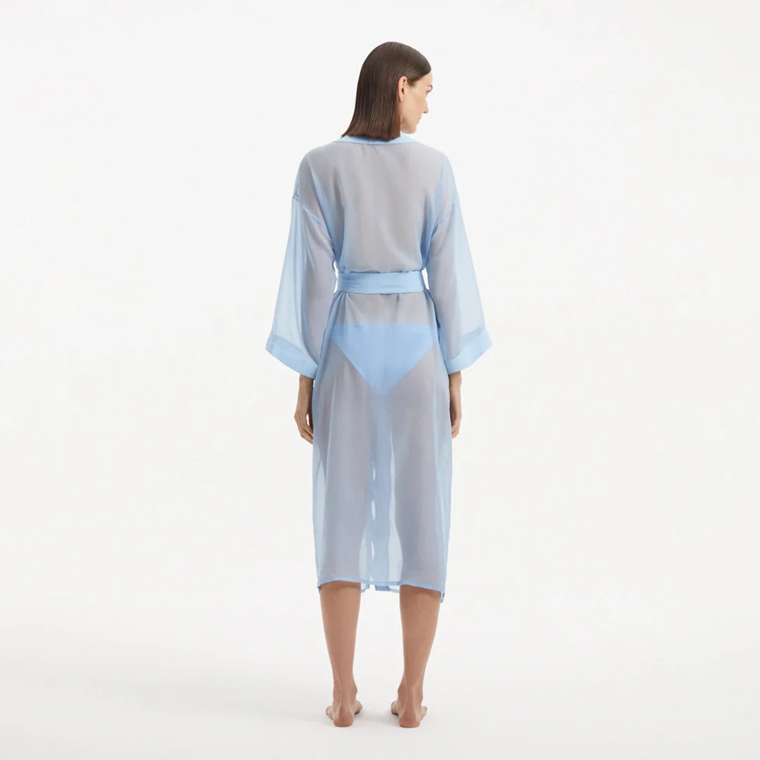 Blaze Long Sleeve Wavy-Trim Belted Sheer Baby Blue Kaftan | Moeva | Kaftan | Each week unveils new pieces—luxury swimwear, fluid resort silhouettes, and elevated summer-to-evening essentials designed to carry you from coastal escapes to city nights.