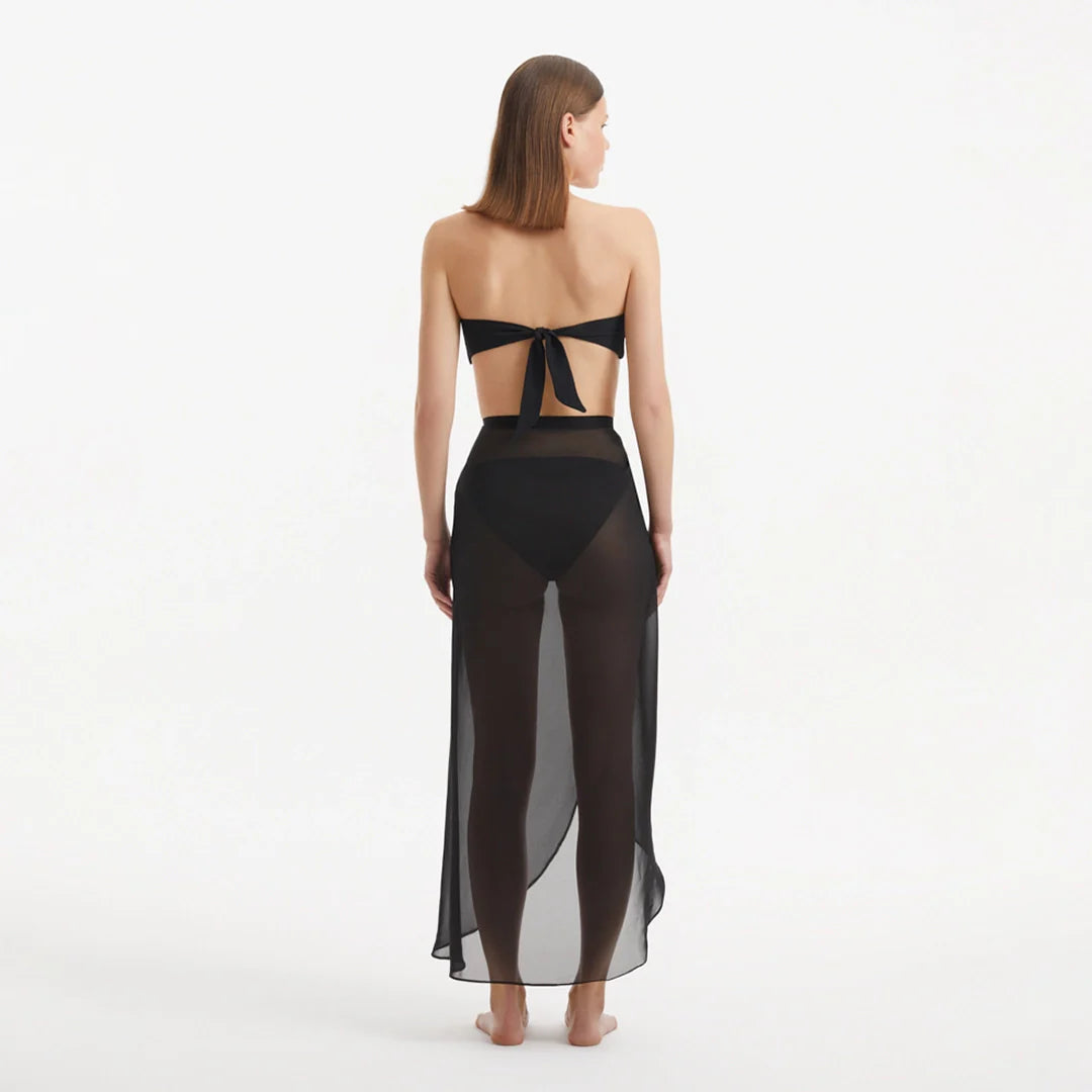 Xander Black Sheer Maxi Skirt with Gold Button Details | Moeva | Skirt | Each week unveils new pieces—luxury swimwear, fluid resort silhouettes, and elevated summer-to-evening essentials designed to carry you from coastal escapes to city nights.