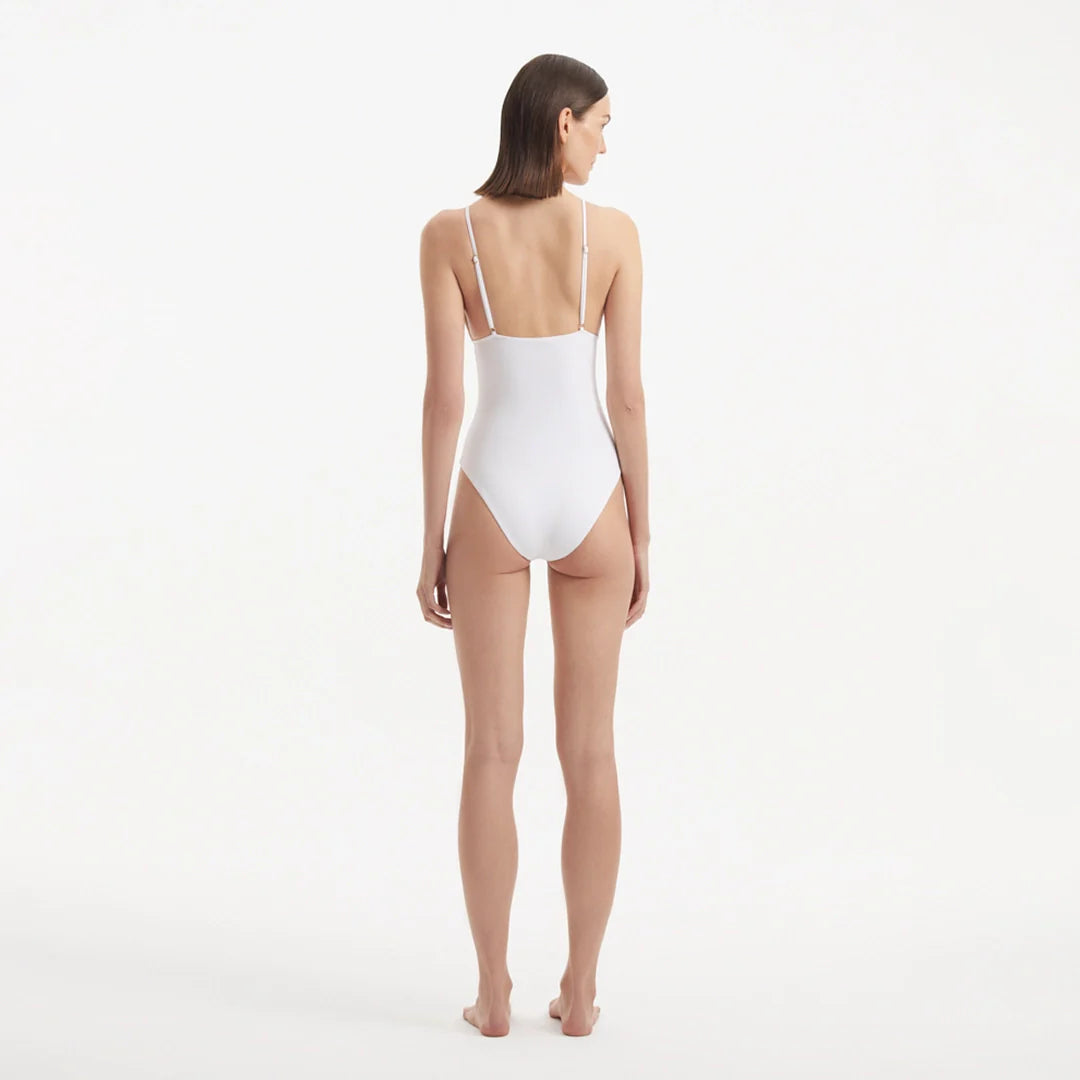 Anahita White V Neck Swimsuit | Moeva | Swimsuit | Each week unveils new pieces—luxury swimwear, fluid resort silhouettes, and elevated summer-to-evening essentials designed to carry you from coastal escapes to city nights.