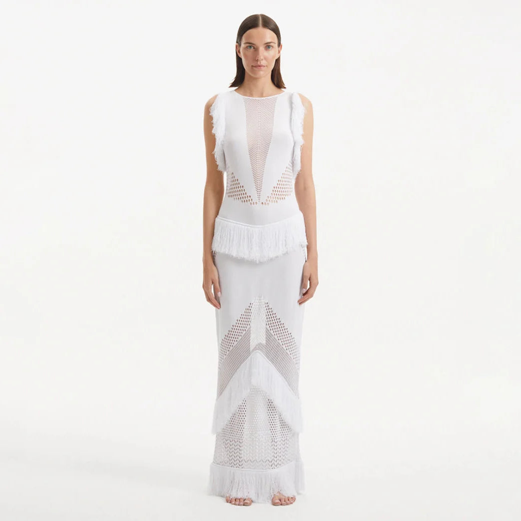 Maris White Knitted Maxi Dress with Fringe and Open Back | Moeva | Dress | Each week unveils new pieces—luxury swimwear, fluid resort silhouettes, and elevated summer-to-evening essentials designed to carry you from coastal escapes to city nights.