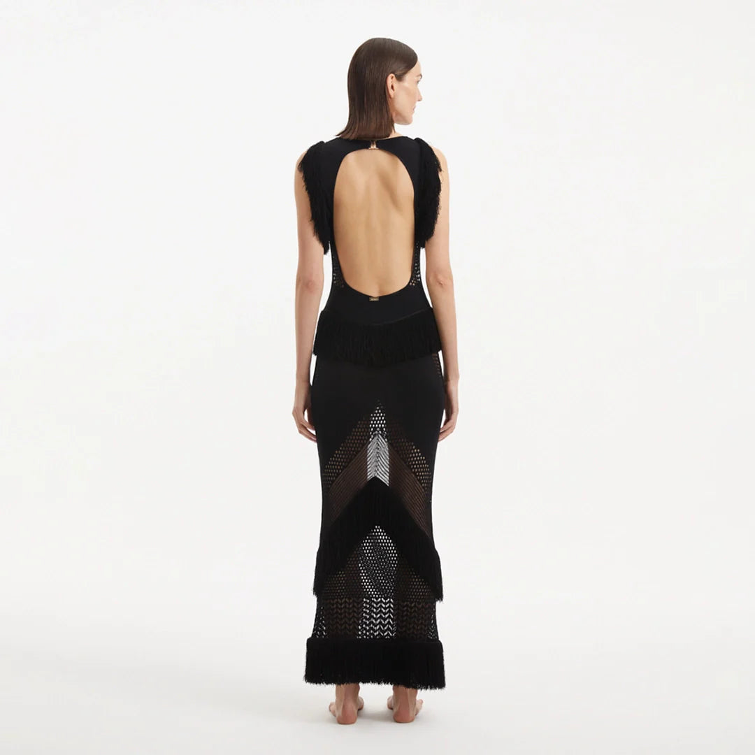 Maris Black Knitted Maxi Dress with Fringe and Open Back | Moeva | Dress | Each week unveils new pieces—luxury swimwear, fluid resort silhouettes, and elevated summer-to-evening essentials designed to carry you from coastal escapes to city nights.