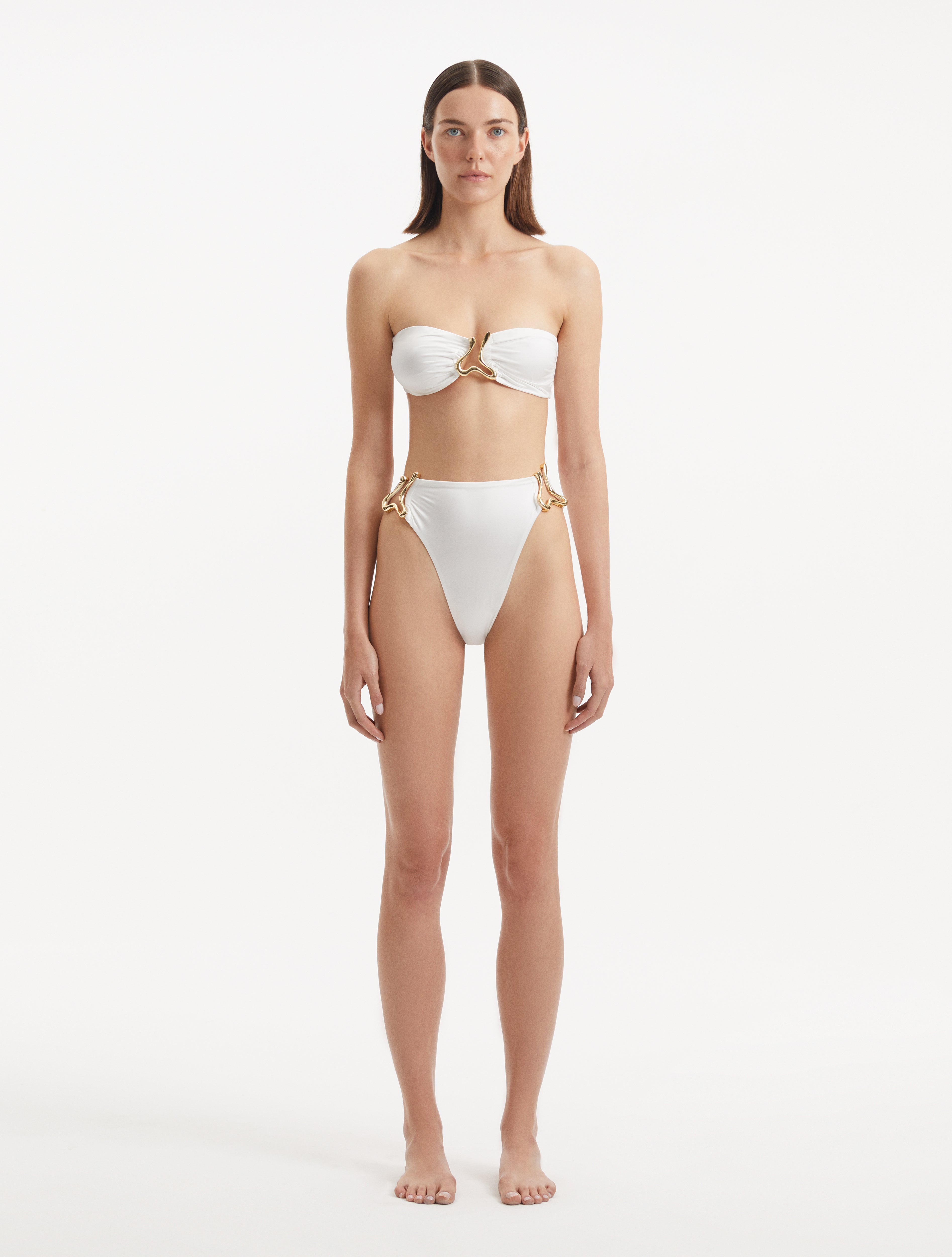 Clyde White Bandeau Satin Bikini Top | Moeva | Bikini Top | Each week unveils new pieces—luxury swimwear, fluid resort silhouettes, and elevated summer-to-evening essentials designed to carry you from coastal escapes to city nights.