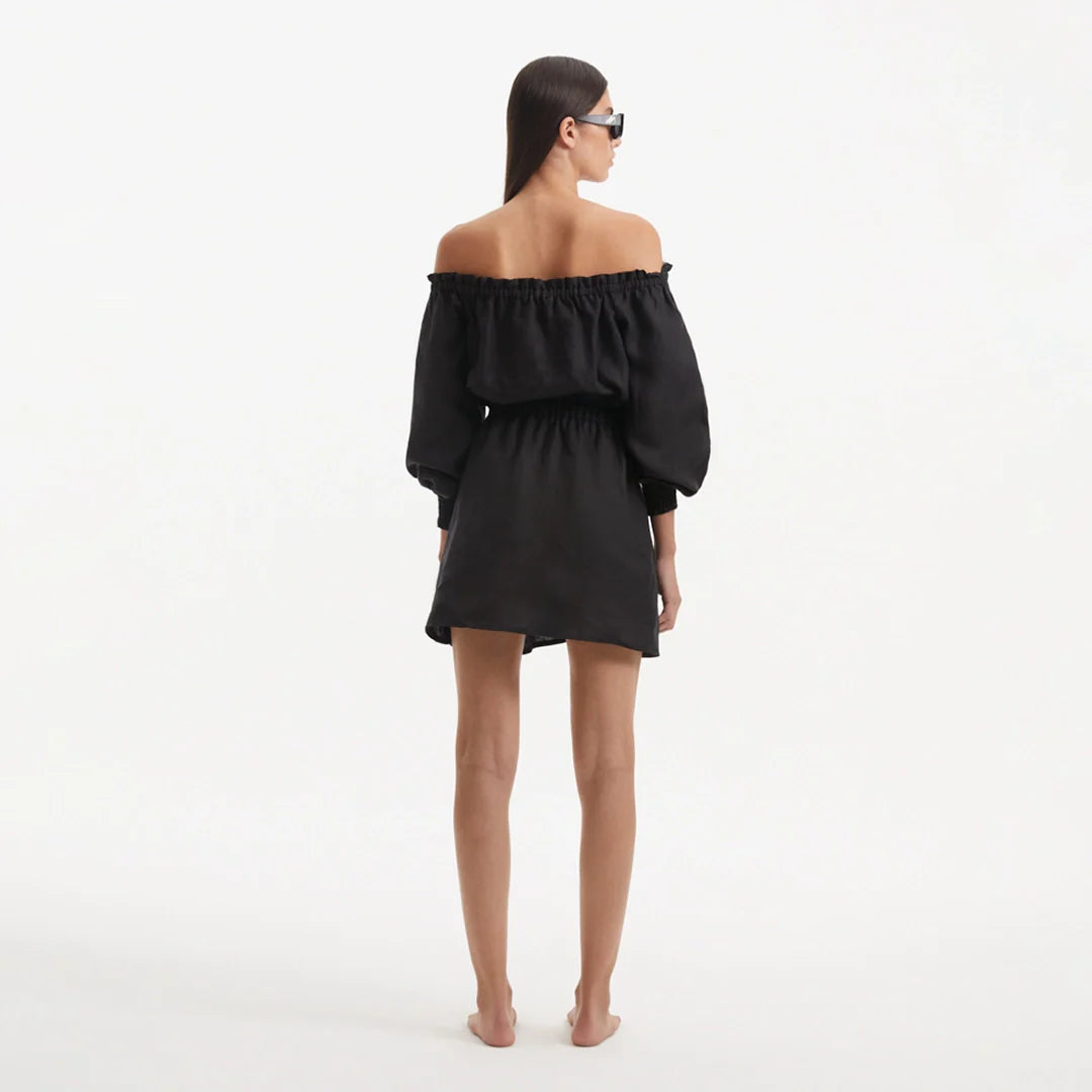Sumner Black Off-Shoulder Linen Mini Dress | Moeva | Dress | Each week unveils new pieces—luxury swimwear, fluid resort silhouettes, and elevated summer-to-evening essentials designed to carry you from coastal escapes to city nights.
