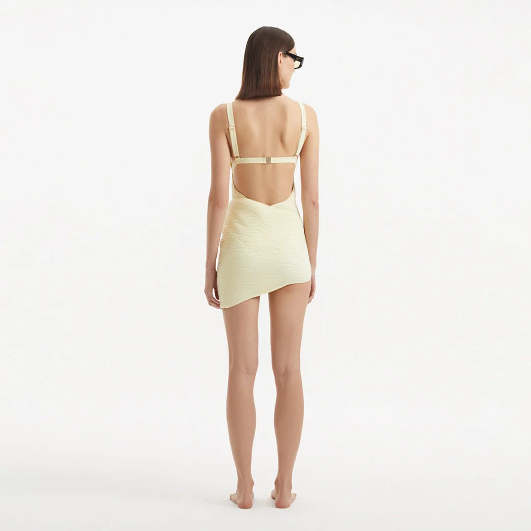 Ephram Yellow Wave-Textured Mini Skirt | Moeva | Skirt | Each week unveils new pieces—luxury swimwear, fluid resort silhouettes, and elevated summer-to-evening essentials designed to carry you from coastal escapes to city nights.
