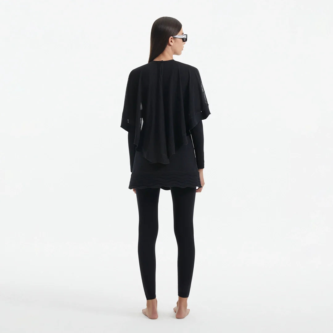 Nasima Black Layered Modest Swim Set | Moeva | Swimsuit | Each week unveils new pieces—luxury swimwear, fluid resort silhouettes, and elevated summer-to-evening essentials designed to carry you from coastal escapes to city nights.