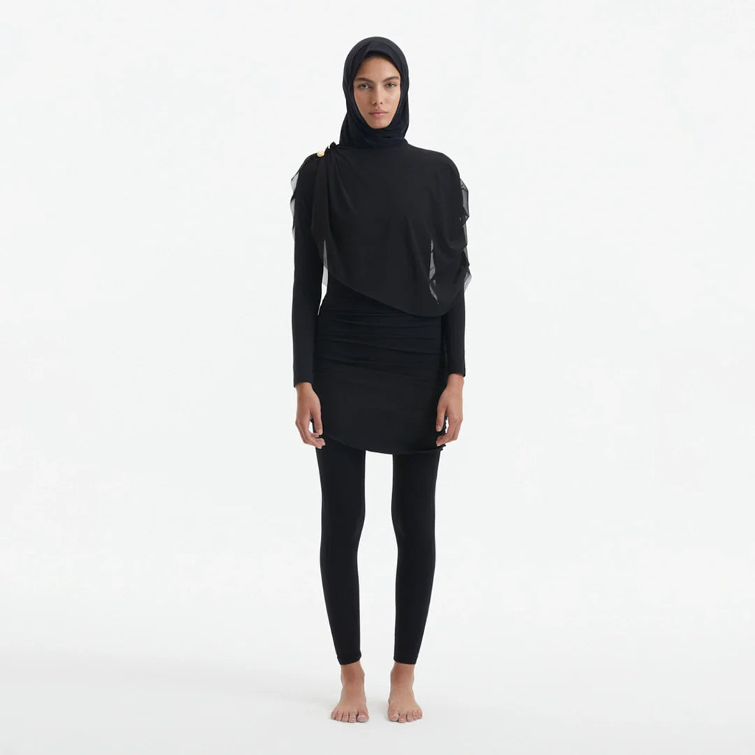 Risha Black Swim Hijab | Moeva | Turban | Each week unveils new pieces—luxury swimwear, fluid resort silhouettes, and elevated summer-to-evening essentials designed to carry you from coastal escapes to city nights.