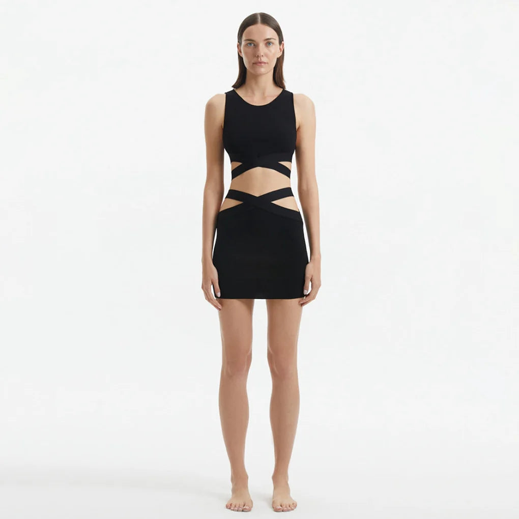 Jazero Black Knitted Cut-Out Skirt | Moeva | Skirt | Each week unveils new pieces—luxury swimwear, fluid resort silhouettes, and elevated summer-to-evening essentials designed to carry you from coastal escapes to city nights.