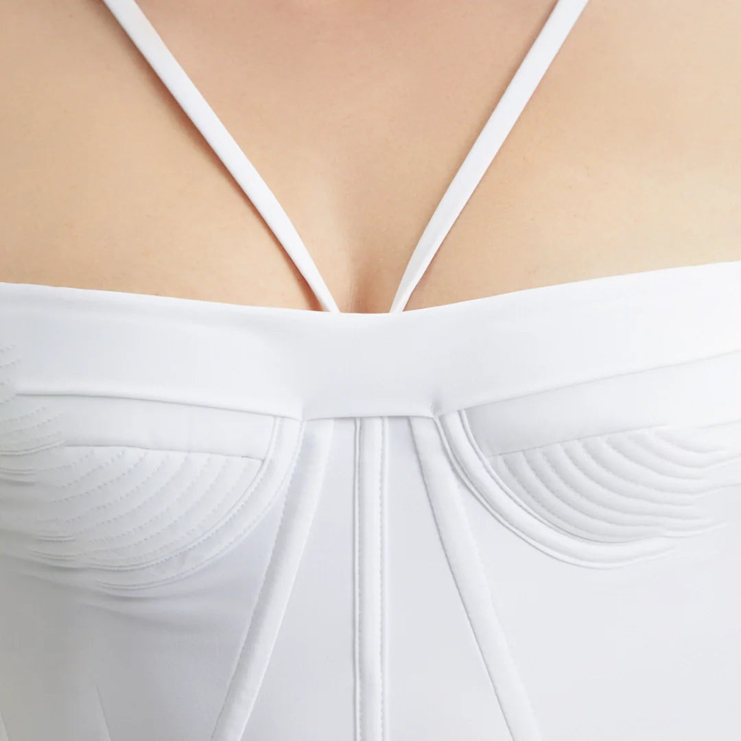 Osaka White Corset Mini Dress with Wrap Skirt | Moeva | Dress | Each week unveils new pieces—luxury swimwear, fluid resort silhouettes, and elevated summer-to-evening essentials designed to carry you from coastal escapes to city nights.