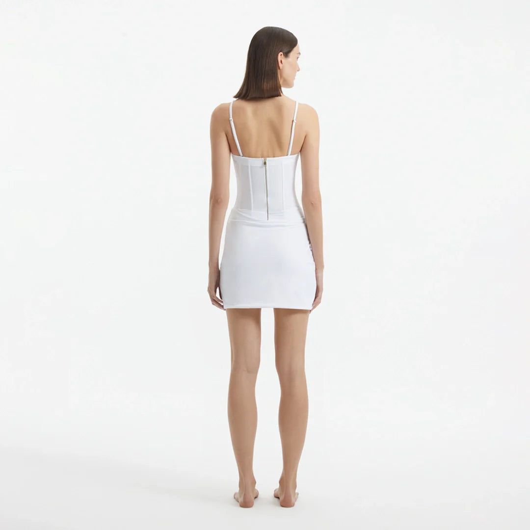Osaka White Corset Mini Dress with Wrap Skirt | Moeva | Dress | Each week unveils new pieces—luxury swimwear, fluid resort silhouettes, and elevated summer-to-evening essentials designed to carry you from coastal escapes to city nights.