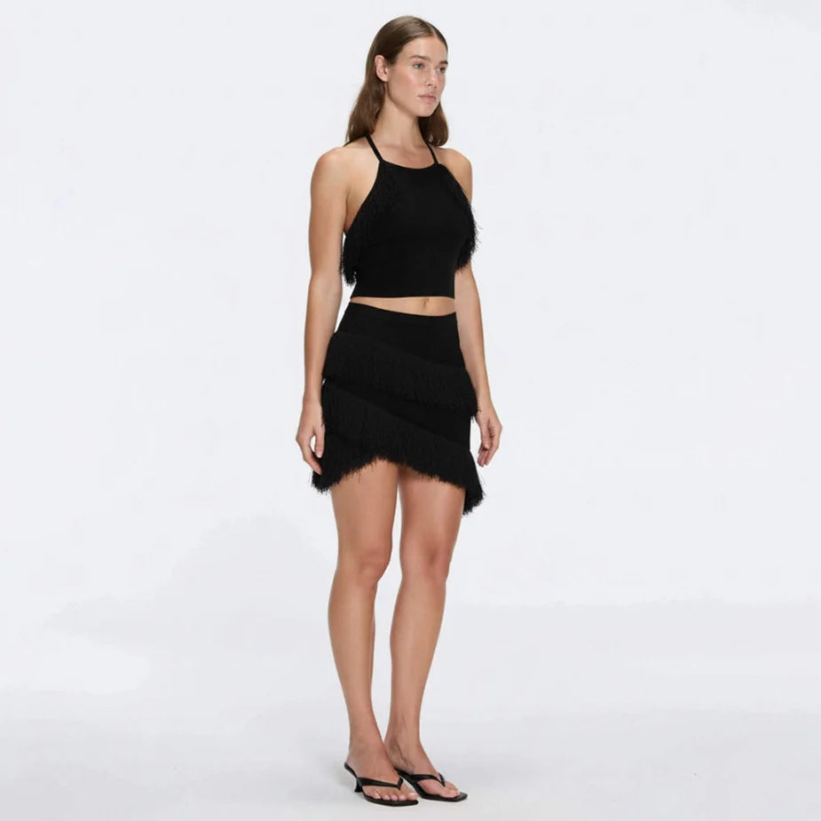 Nebula And Arlo Fringe Asymmetric Black Knit Set | Moeva | Set | Each week unveils new pieces—luxury swimwear, fluid resort silhouettes, and elevated summer-to-evening essentials designed to carry you from coastal escapes to city nights.