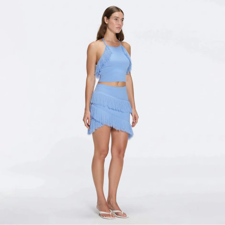 Nebula And Arlo Fringe Asymmetric Blue Knit Set | Moeva | Set | Each week unveils new pieces—luxury swimwear, fluid resort silhouettes, and elevated summer-to-evening essentials designed to carry you from coastal escapes to city nights.
