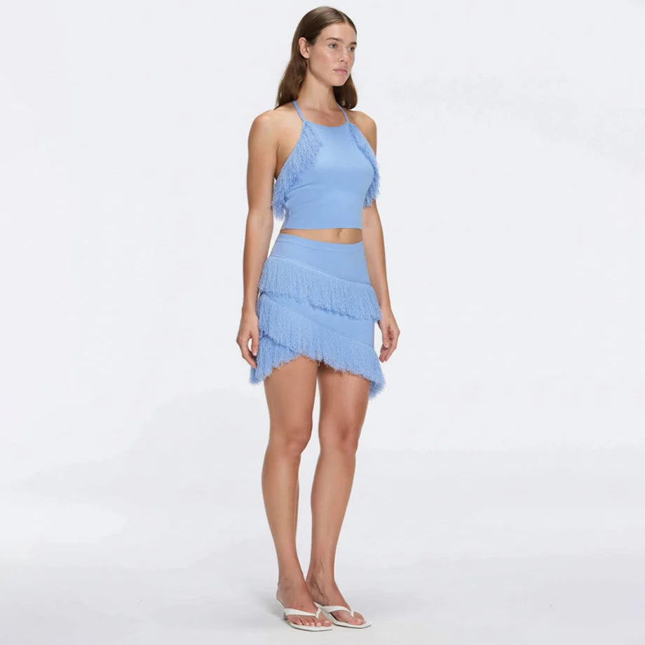 Nebula Blue Fringe Detail Halter Knit Top | Moeva | Crop Top | Each week unveils new pieces—luxury swimwear, fluid resort silhouettes, and elevated summer-to-evening essentials designed to carry you from coastal escapes to city nights.
