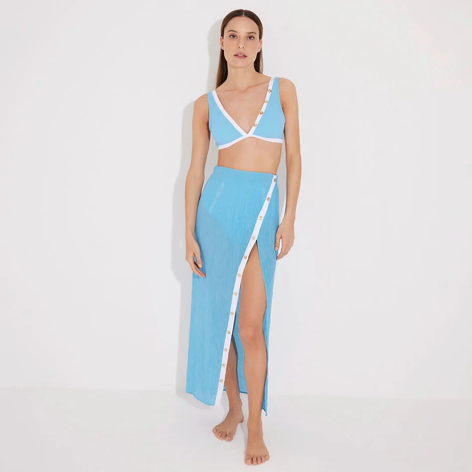 Pina Blue/White Asymmetric Gold Button Maxi Skirt | Moeva | Skirt | Each week unveils new pieces—luxury swimwear, fluid resort silhouettes, and elevated summer-to-evening essentials designed to carry you from coastal escapes to city nights.