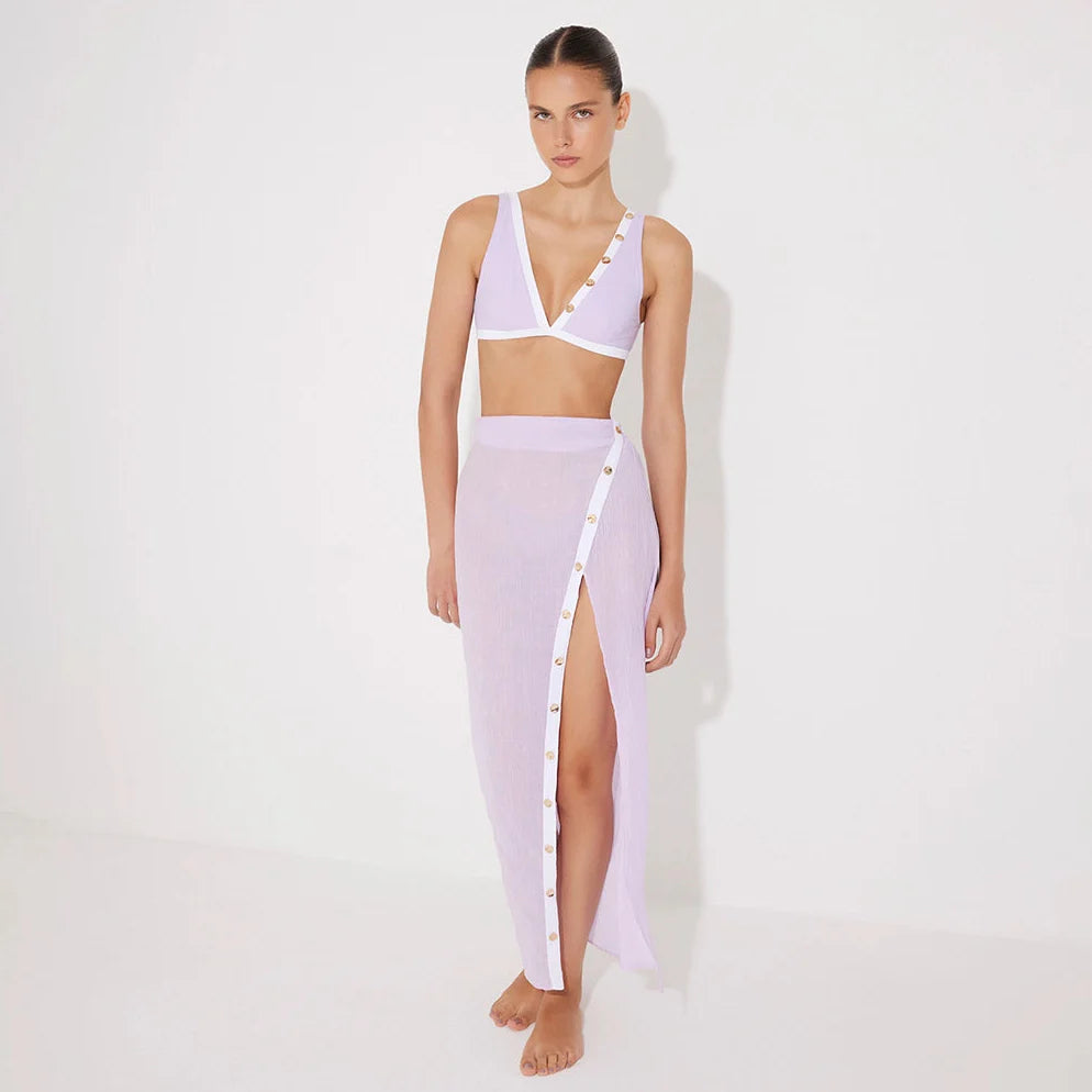 Pina Lilac/White Asymmetric Gold Button Maxi Skirt | Moeva | Skirt | Each week unveils new pieces—luxury swimwear, fluid resort silhouettes, and elevated summer-to-evening essentials designed to carry you from coastal escapes to city nights.
