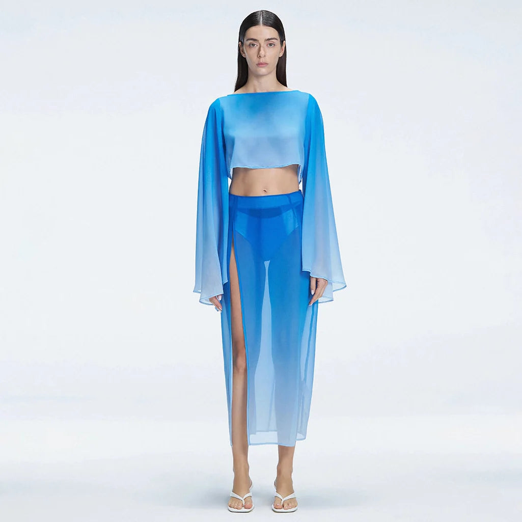 Tabitha Blue Optical Maxi Skirt | Moeva | Skirt | Each week unveils new pieces—luxury swimwear, fluid resort silhouettes, and elevated summer-to-evening essentials designed to carry you from coastal escapes to city nights.