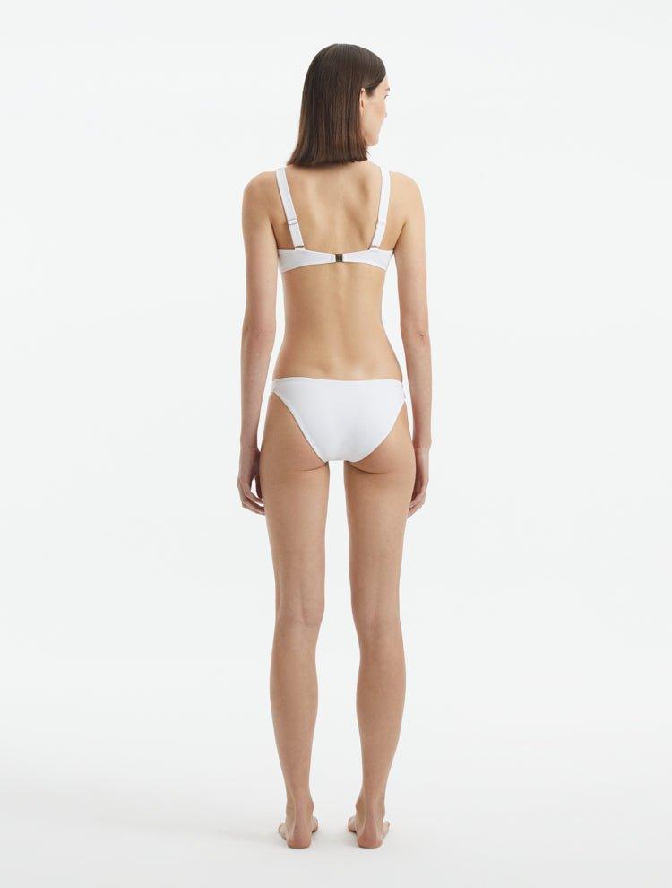 Aeron White V Neck Textured Bikini Top | Moeva | Bikini Top | Each week unveils new pieces—luxury swimwear, fluid resort silhouettes, and elevated summer-to-evening essentials designed to carry you from coastal escapes to city nights.