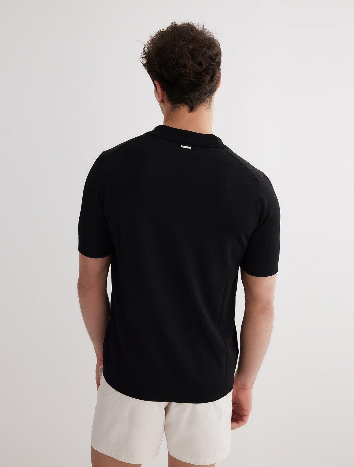 Lars Black Polo Shirt with Button Fastening | Moeva | T-Shirt | Each week unveils new pieces—luxury swimwear, fluid resort silhouettes, and elevated summer-to-evening essentials designed to carry you from coastal escapes to city nights.