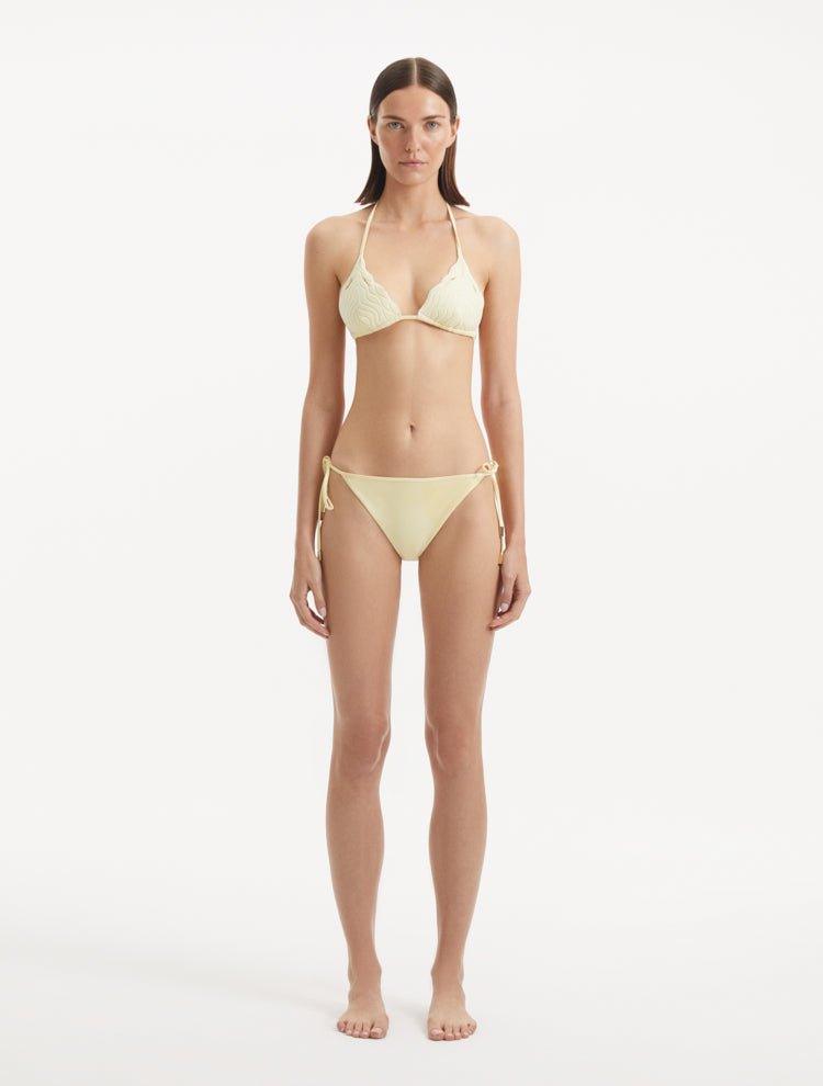 Sober Magazine - Sarita Yellow Triangle Wave Textured Side Tie Bikini Set | Moeva | Bikini Set | Each week unveils new pieces—luxury swimwear, fluid resort silhouettes, and elevated summer-to-evening essentials designed to carry you from coastal escapes to city nights.