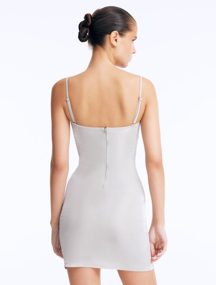 Senna Silver Cut-Out Mini Dress with Accessory Detail | Moeva | Dress | Each week unveils new pieces—luxury swimwear, fluid resort silhouettes, and elevated summer-to-evening essentials designed to carry you from coastal escapes to city nights.
